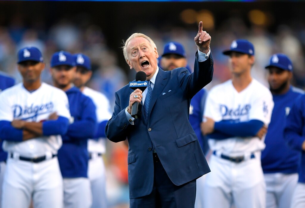 FILE - In this May 3, 2017, file photo, Los Angeles Dodgers broadcaster Vin Scully speaks during his induction into the team's Ring of Honor prior to a baseball game between the Dodgers and the San Francisco Giants, in Los Angeles. Vin Scully will receive the Icon Award at The ESPYS, with actor Bryan Cranston presenting the honor given to those whose careers have left a lasting impression on the sports world.
Scully retired last fall after 67 years calling Los Angeles Dodgers games. (AP Photo/Mark J. Terrill, File)