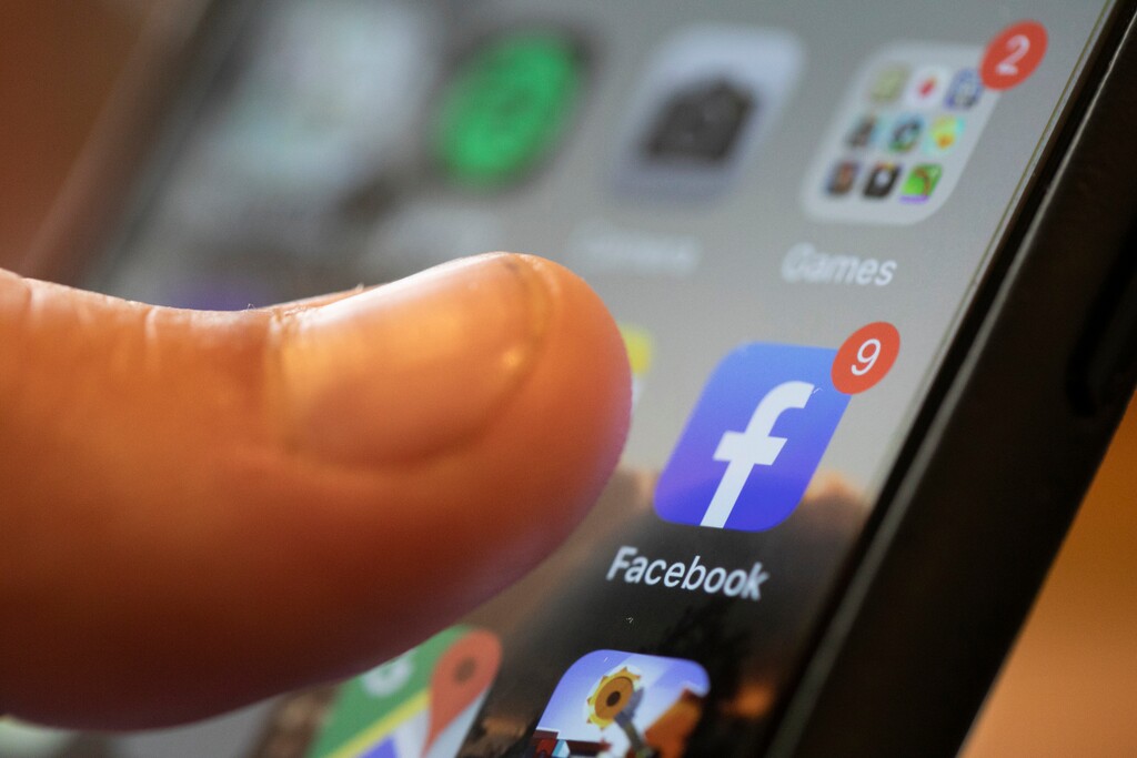 (Jenny Kane | AP file) In this Aug. 11, 2019, photo an iPhone displays the Facebook app in New Orleans. Facebook says it won't allow interference with the U.S. census on its platform, including posting misleading information about when and how to participate, who can participate and the consequences of taking part.