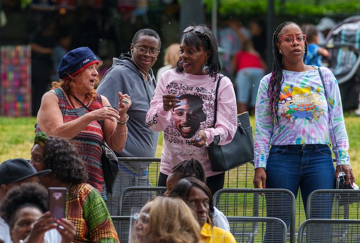 (Leah Hogsten | The Salt Lake Tribune) Ogden Juneteeth celebrants dance to musical performers at the Utah Juneteenth Celebration at the Ogden City Amphitheater, Saturday, June 18, 2022. 