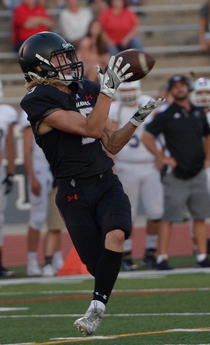 (Leah Hogsten  |  The Salt Lake Tribune) Alta's London Rockwood with his first half touchdown catch. Lehi High School leads Alta High School 42-28 during their game, Friday, August 18, 2017 in Sandy. 