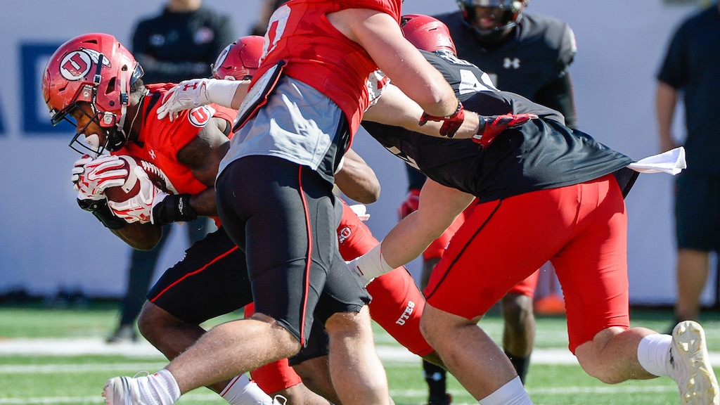 (Francisco Kjolseth | The Salt Lake Tribune) Devonta'e Henry-Cole, #7, pushes past the defense as the Utah Utes hold their first of two major scrimmages of spring practice at Rice Eccles stadium on Saturday, March 30, 2019, prior to the April 13 Red-White Game.