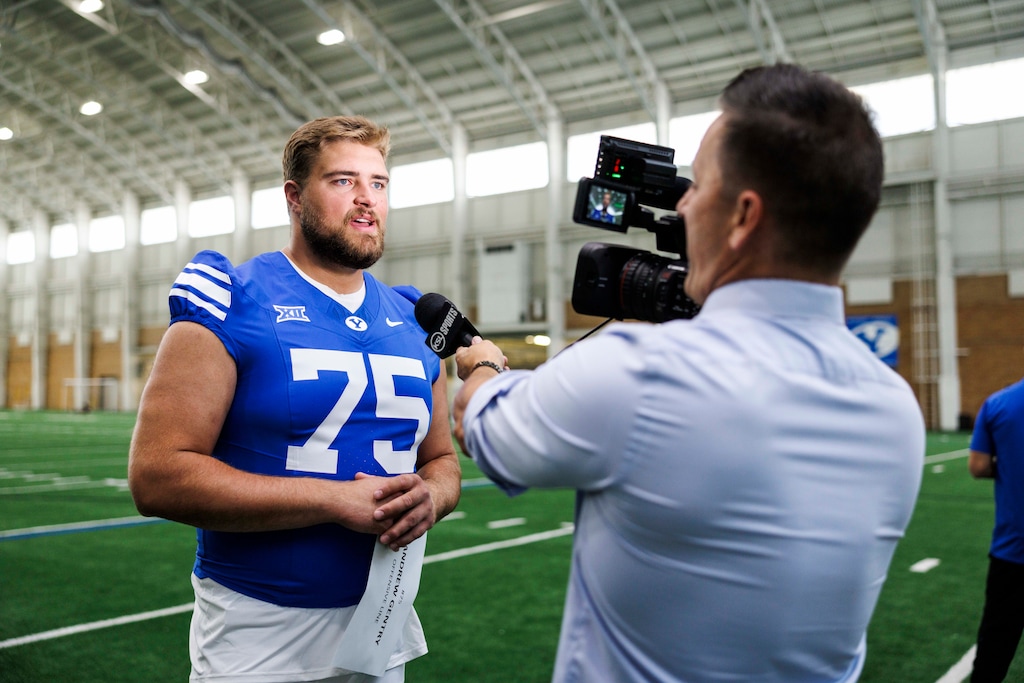 (Christi Norris |BYU) Cougars offensive lineman Andrew Gentry is interviewed in Provo, Utah, during the football team's 2025 fall training camp.
