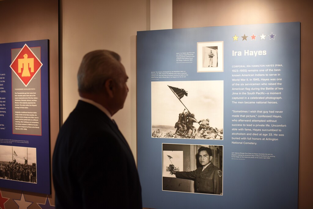 (Michael Robinson Chavez | The Washington Post) 
 Jefferson Keel, a Native American Vietnam vet, who was awarded a Bronze Star, looks at an exhibit dedicated to Native American vets at the Museum of the American Indian.