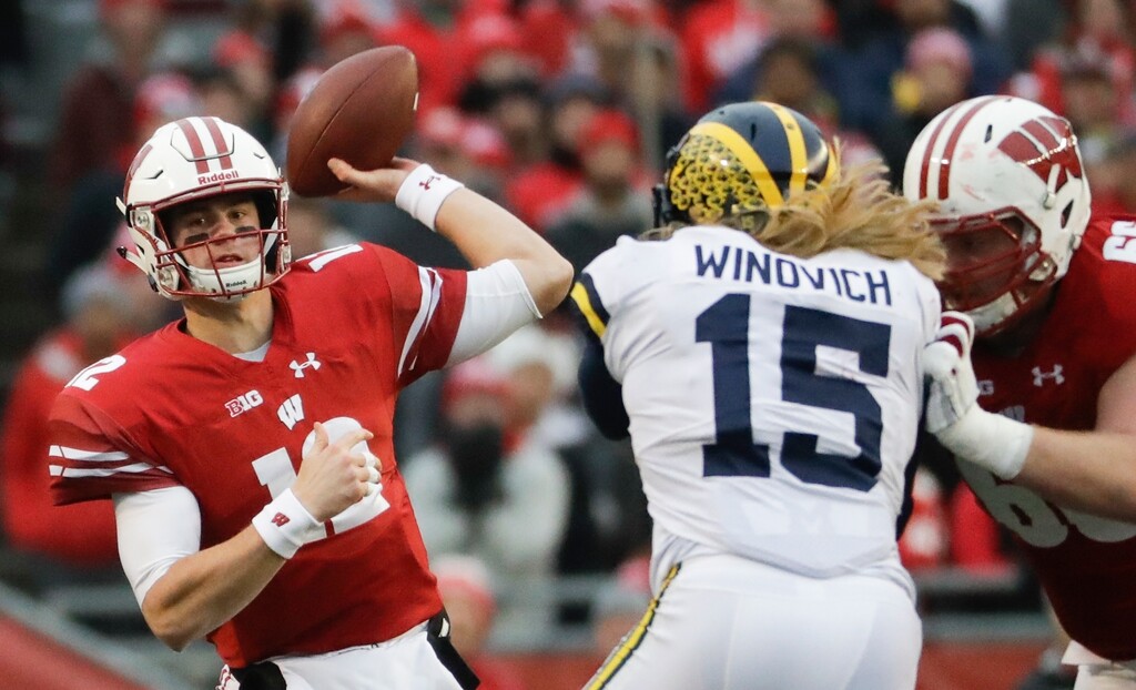 Wisconsin's Alex Hornibrook throws during the first half of an NCAA college football game against the Michigan Saturday, Nov. 18, 2017, in Madison, Wis. (AP Photo/Morry Gash)