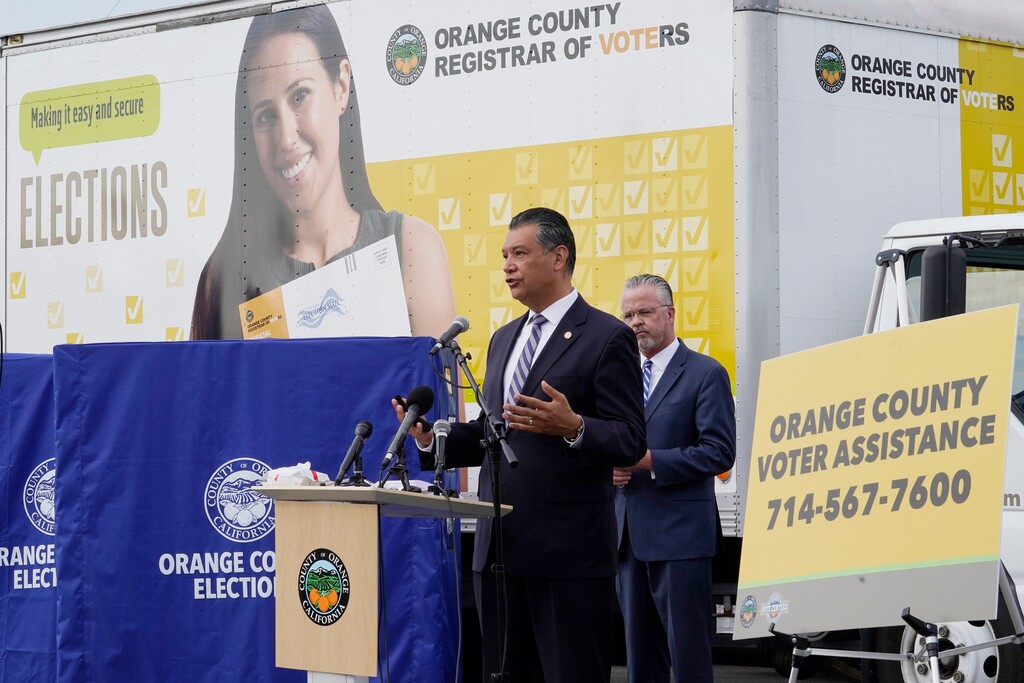 (Damian Dovarganes | AP photo)
In this Oct. 5 photo, California Secretary of State Alex Padilla, left, and Orange County Registrar of Voters Neal Kelley hold a news conference on Orange County's comprehensive plans to safeguard the election and provide transparency in Santa Ana, Calif. California election officials have received reports that unofficial ballot drop boxes were placed in several counties and said these set-ups are illegal. The Orange County Register reports Monday, Oct. 12, 2020, that Secretary of State spokesman Sam Mahood said boxes were reported in Fresno, Los Angeles and Orange counties at locations including political party offices, candidate headquarters and churches. He said the state was looking into the origin of the boxes.