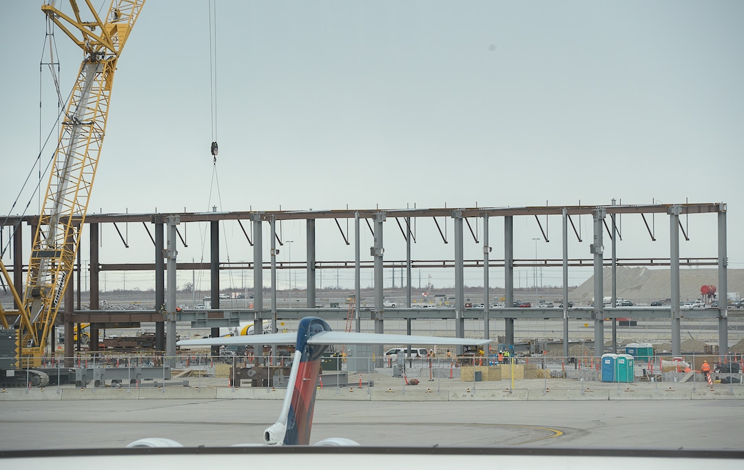 (Francisco Kjolseth  |  The Salt Lake Tribune)  Concourse B begins to take shape in the distance during a recent tour by Salt Lake City International Airport announcing food concessionaires for the new expanded airport on Wed. Feb. 20, 2019.