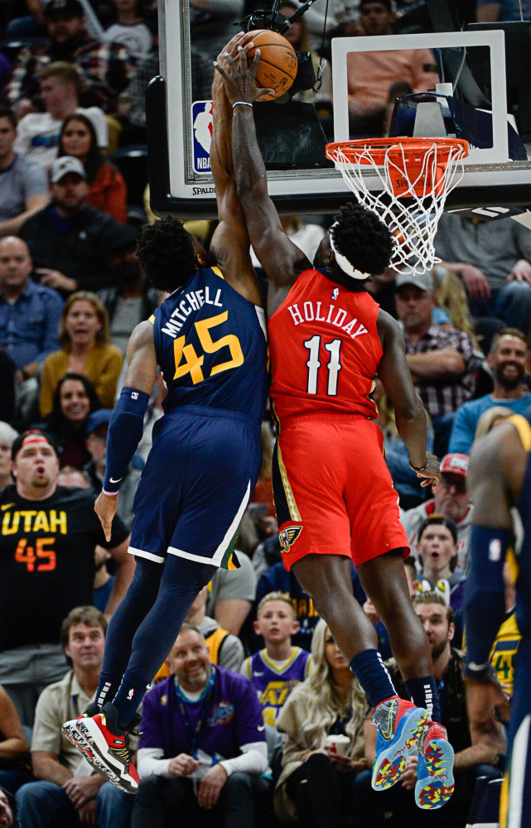 (Francisco Kjolseth  |  The Salt Lake Tribune)  Utah Jazz guard Donovan Mitchell (45) is blocked by New Orleans Pelicans guard Jrue Holiday (11) as the Utah Jazz host the New Orleans Pelicans in their NBA basketball game at Vivint Smart Home Arena in Salt Lake City on Sat. Nov. 23, 2019.