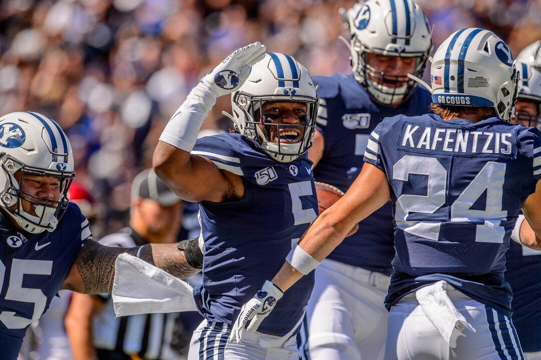 (Trent Nelson  |  The Salt Lake Tribune)  
Brigham Young Cougars defensive back Dayan Ghanwoloku (5) celebrates a touchdown as BYU hosts USC, NCAA football in Provo on Saturday Sept. 14, 2019.