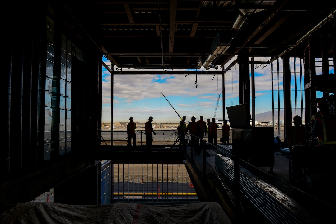 Leah Hogsten  |  The Salt Lake Tribune Salt Lake City International Airport redevelopment project managers lead members of the media on a tour of the airport expansion construction site, Monday, Oct. 22, 2018. The first phase construction of the $3.6 billion project is due to open in 700 days. Nearing completion is the new concourse for aircraft gates, an enclosed terminal, the steel skeleton of a new "gateway" building, a five-story parking garage and elevated roadways. 