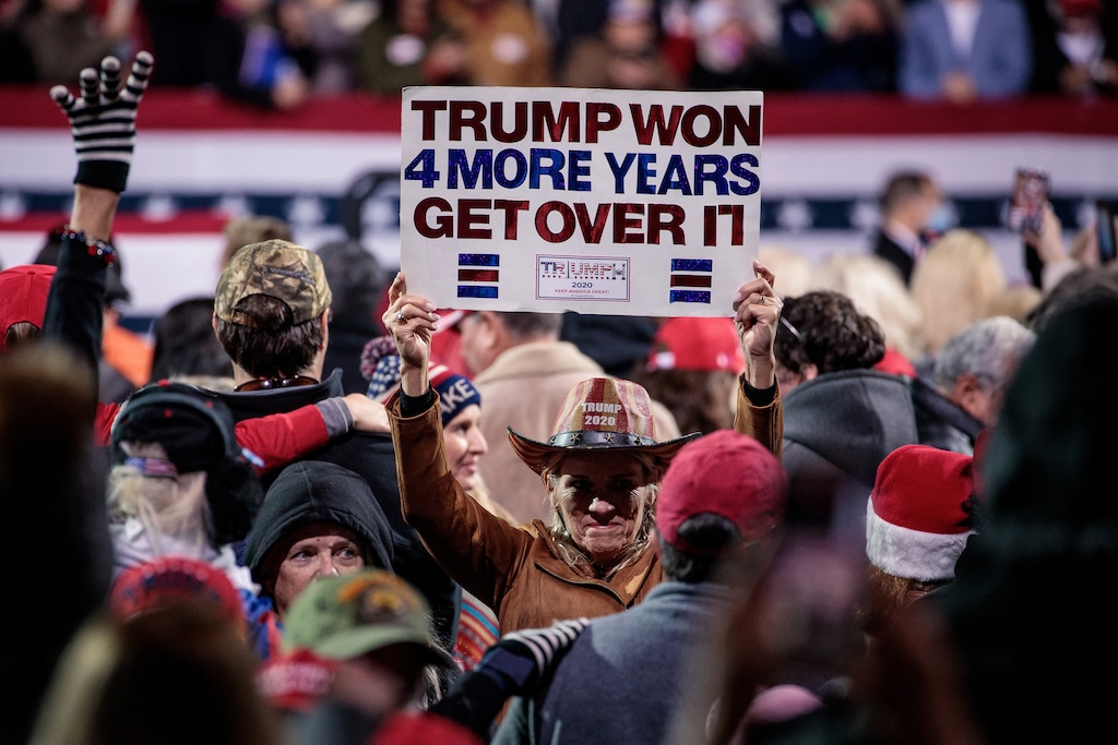 (Damon Winter |The New York Times)
A supporter of President Donald Trump holds up a sign while attending a campaign event for Georgia's Republican senators at an airport in Valdosta, Ga., Dec. 5, 2020. "More than one conservative writer warned liberals that the refusal to let Trump officials eat in peace could lead to Trump’s re-election," writes New York Times columnist Michelle Goldberg. "Somehow, though, few are asking the same question of Republicans as Trump devotees terrorize election workers and state officials over the president’s relentless lies about voter fraud."