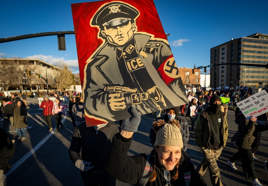 (Rick Egan | The Salt Lake Tribune) People march at a protest against federal immigration actions in Salt Lake City on Sunday, Jan 25, 2026.