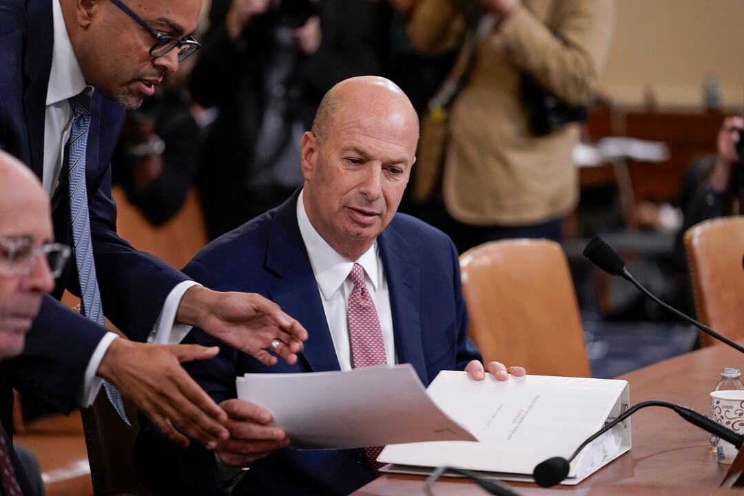 (J. Scott Applewhite  |  Ap photo) Attorney Kwame Manley, top left, assists U.S. Ambassador to the European Union Gordon Sondland, with lawyer Robert Luskin, left, before he testifies to the House Intelligence Committee on Capitol Hill in Washington, Wednesday, Nov. 20, 2019, during a public impeachment hearing of President Donald Trump's efforts to tie U.S. aid for Ukraine to investigations of his political opponents. 