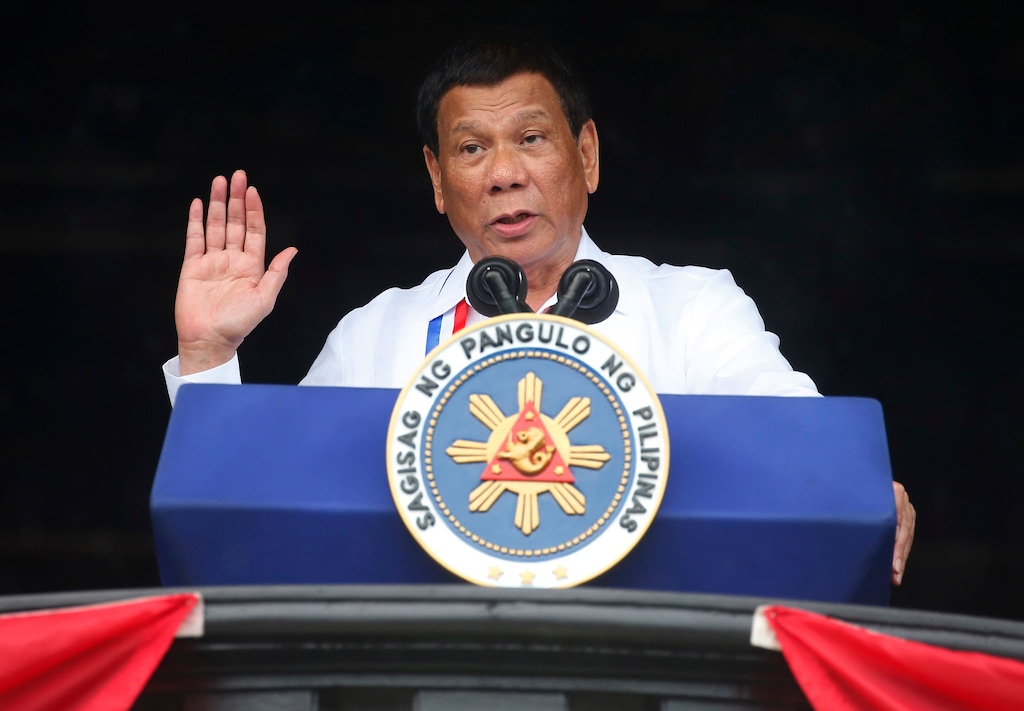 FILE - In this Tuesday, June 11, 2018, file photo, Philippine President Rodrigo Duterte gestures while addressing the crowd at the 120th Philippine Independence Day celebrations south of Manila, Philippines. President Duterte, notorious for having insulted the pope and former U.S. President Barack Obama, has sparked outrage for calling God "stupid" in Asia's bastion of Catholicism. (AP Photo/Bullit Marquez, File)
