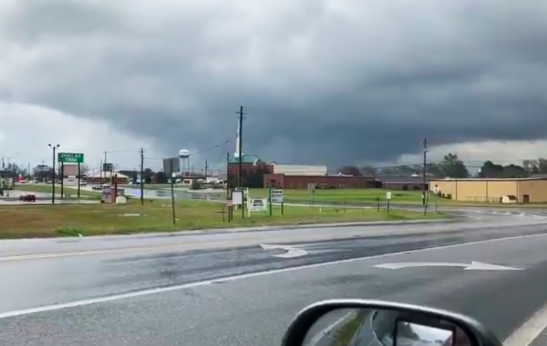 This photo provided by Greg Martin shows a funnel cloud in Byron, Ga., Sunday, March 3, 2019. The National Weather Service on Sunday issued a series of tornado warnings stretching from Phenix City, Alabama, near the Georgia state line to Macon, Georgia, about 100 miles (160 kilometers) to the east. (Greg Martin via AP)