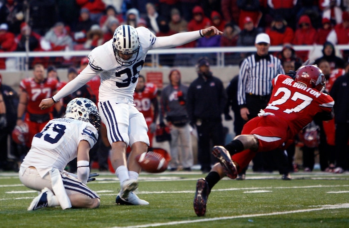 (Trent Nelson  |  Tribune file photo)  Utah Utes cornerback Brandon Burton #27 blocks field goal attempt by BYU kicker Mitch Payne (38) at Rice-Eccles Stadium Saturday, November 27, 2010. The final score was Utah 17-BYU 16.