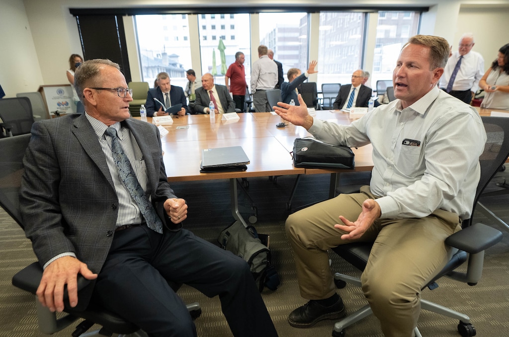 (Francisco Kjolseth | The Salt Lake Tribune) Gene Shawcroft, left, commissioner and chair of the new six-member council from the Colorado River Authority of Utah, speaks with council member Dan Larsen following their inaugural meeting in Salt Lake City on Friday, July 30, 2021.