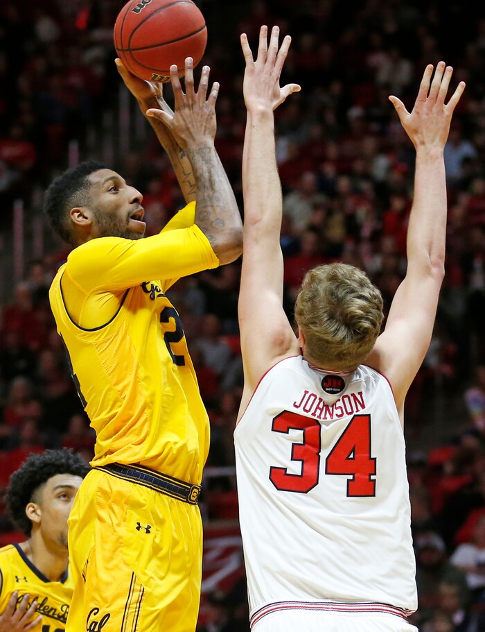 California forward Marcus Lee (24) shoots as Utah forward Jayce Johnson (34) defends during the first half during an NCAA college basketball game Saturday, Feb. 10, 2018, in Salt Lake City. (AP Photo/Rick Bowmer)