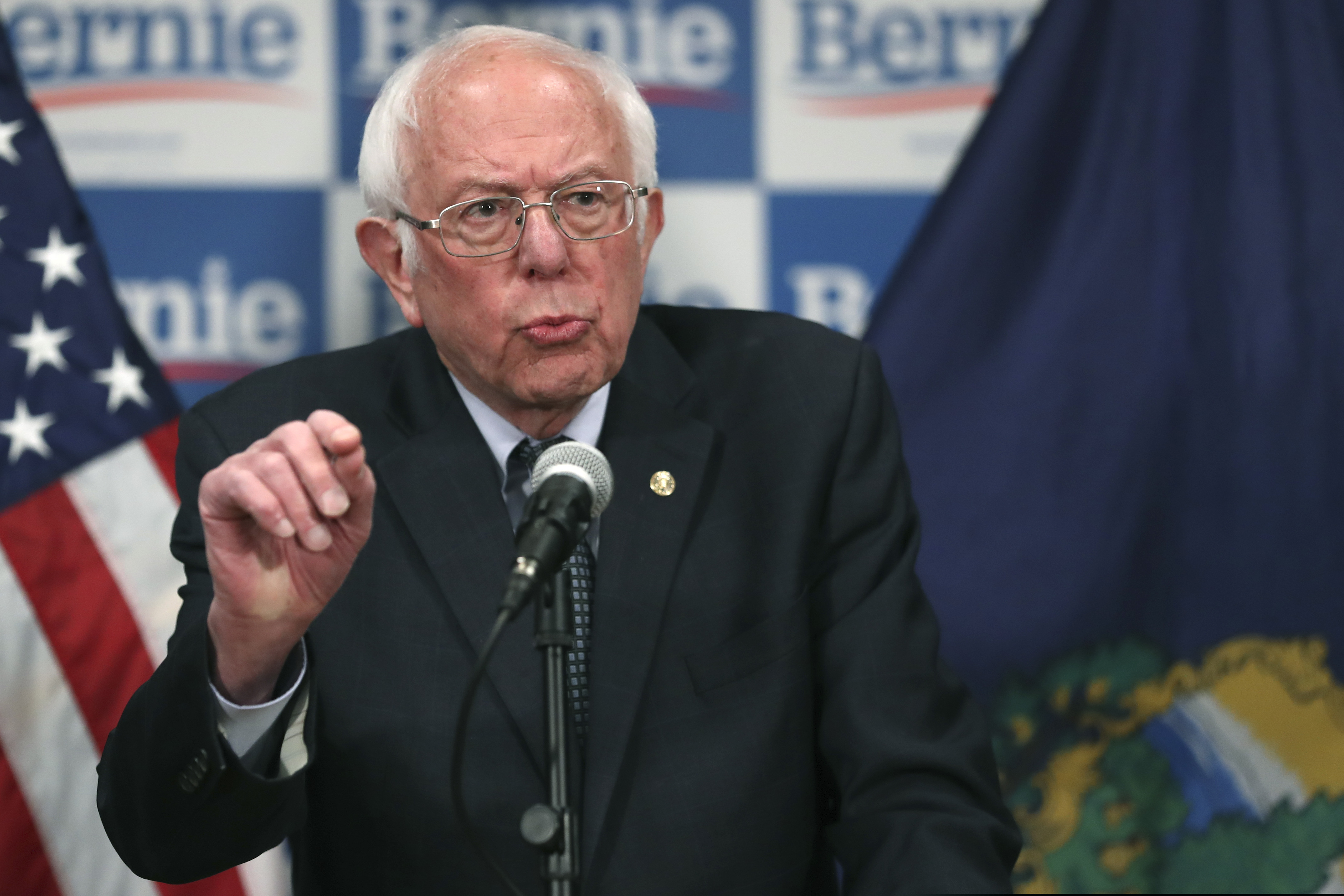 (Charles Krupa | The Associated Press) Democratic presidential candidate, Sen. Bernie Sanders, I-Vt., speaks to reporters about coronavirus Thursday March 12, 2020, in Burlington, Vt.