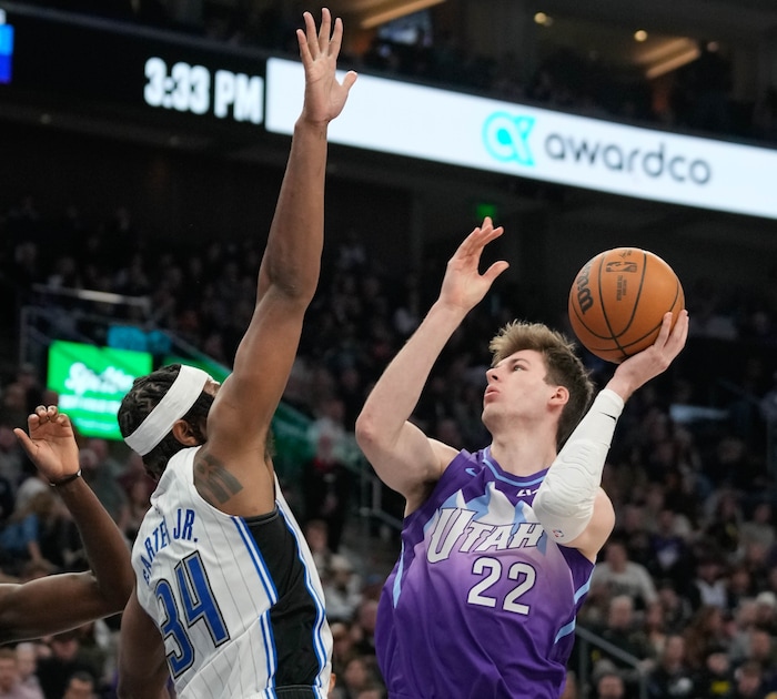 (Francisco Kjolseth  | The Salt Lake Tribune) Orlando Magic center Wendell Carter Jr. (34) pressures Utah Jazz forward Kyle Filipowski (22) as the Utah Jazz host the Orlando Magic during NBA basketball at the Delta Center in Salt Lake City on Saturday, February. 1, 2025.