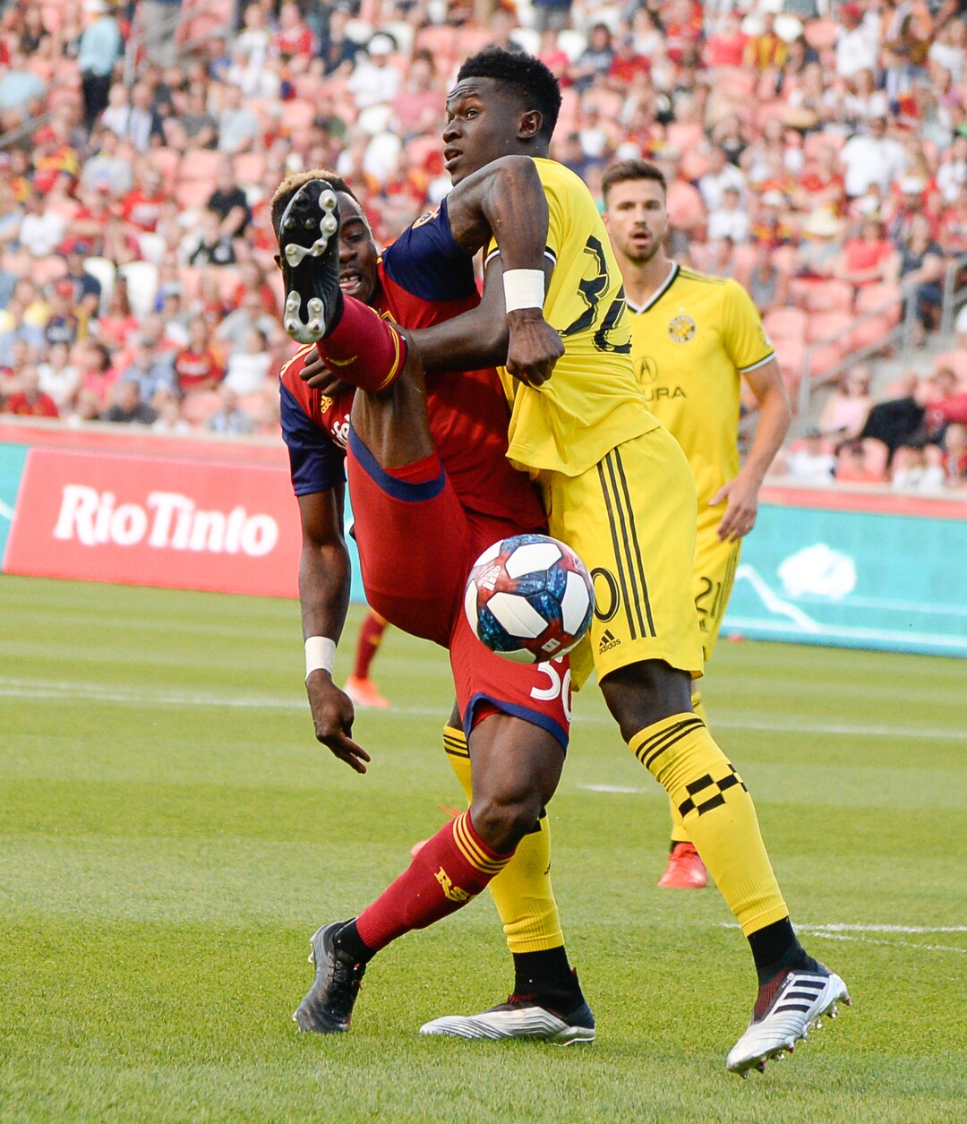 (Francisco Kjolseth  |  The Salt Lake Tribune)  Real Salt Lake forward Sam Johnson (50) gets hung up on Aboubacar Keita (30) as Real Salt Lake hosts Columbus Crew SC, in MLS Soccer at Rio Tinto Stadium in Sandy, Utah on Wed, July 3, 2019.