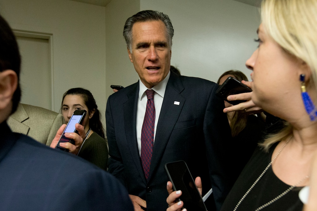 (Jose Luis Magana | AP file photo) Sen. Mitt Romney, R-Utah, talks to reporters as he walks to attend the impeachment trial of President Donald Trump on charges of abuse of power and obstruction of Congress, Tuesday, Jan. 28, 2020, on Capitol Hill in Washington.