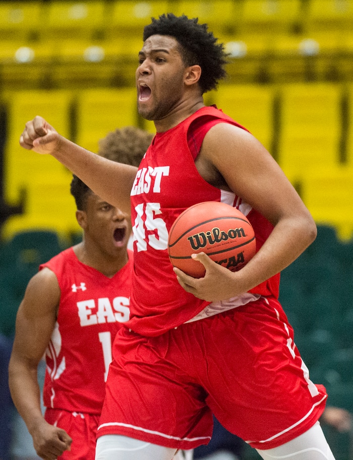 (Rick Egan  |  The Salt Lake Tribune)   East Leopards Mikey Frazier (45) celebrates East High's 54-53 win over the Jordan Beatdiggers, in 5A basketball playoff action at the UCCU Center in Orem, Monday, Feb. 26, 2018.