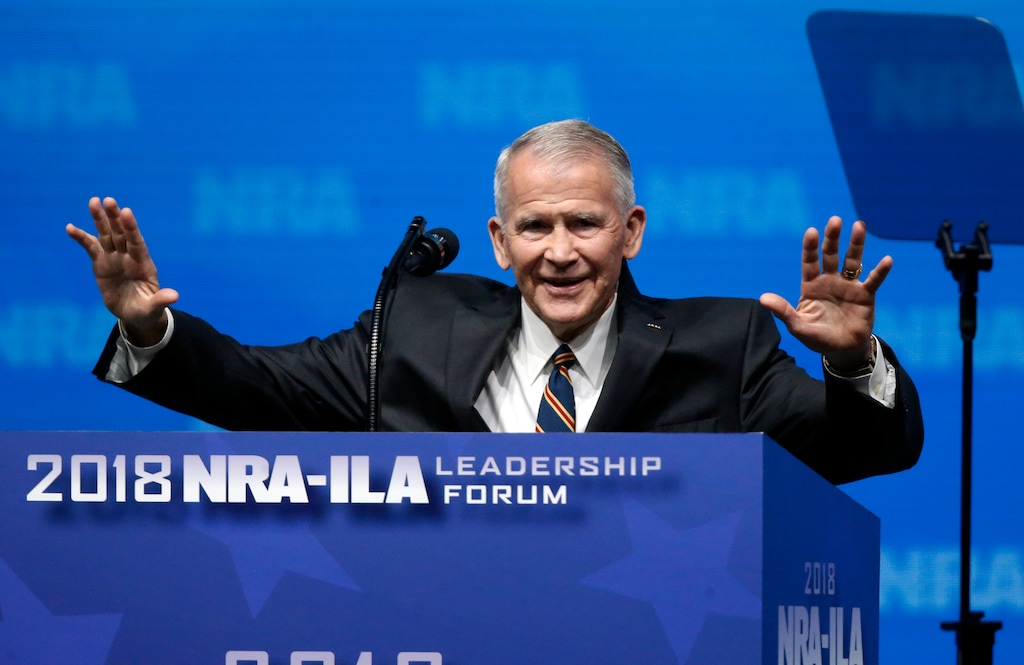 (AP Photo/Sue Ogrocki) In this May 4, 2018 photo, former U.S. Marine Lt. Col. Oliver North acknowledges attendees as he gives the Invocation at the National Rifle Association-Institute for Legislative Action Leadership Forum in Dallas.   The NRA has announced that North will become president of the National Rifle Association of America within a few weeks, a process the NRA Board of Directors initiated this morning.