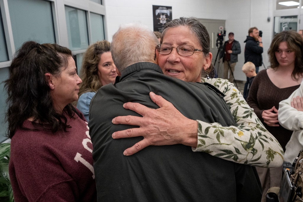 (Trent Nelson  |  The Salt Lake Tribune) Michelle Impala embraces Brent Bullock after a news conference announcing the connection of serial killer Ted Bundy with the case of Impala's sister, Laura Ann Aime, a teen who went missing in 1974. The news conference was held in Spanish Fork on Wednesday, April 1, 2026. Bullock was one of the original investigators on the case.