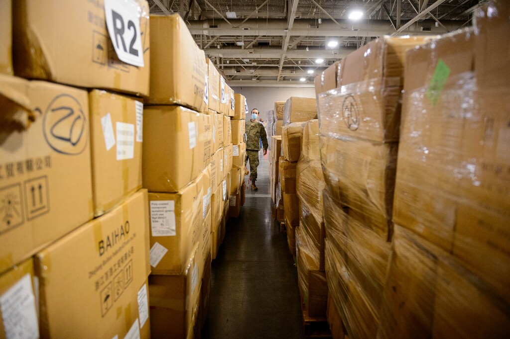 (Trent Nelson  |  Tribune file photo) Workers organize supplies at the Receiving, Staging and Shipping Center at the Salt Palace Convention Center in Salt Lake City, May 8, 2020. The center served as a central location for personal protective equipment received by the State of Utah and sent to hospitals, local health departments and emergency managers.