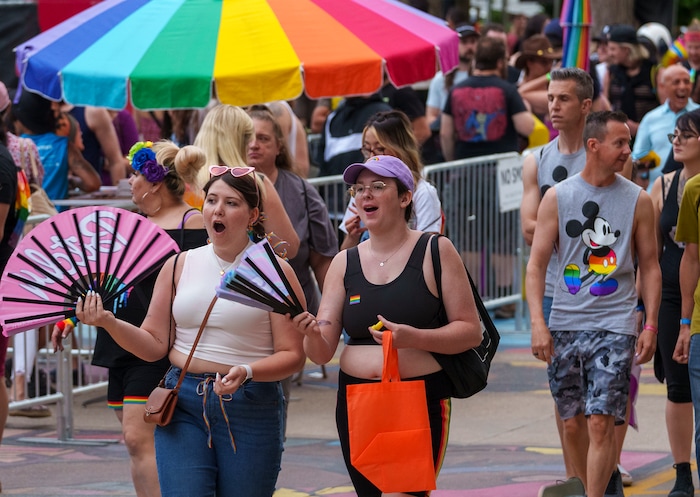 (Leah Hogsten | The Salt Lake Tribune)  Pride festival revelers enjoy the Utah Pride Festival at Washington Square, Saturday, June 4, 2022. 