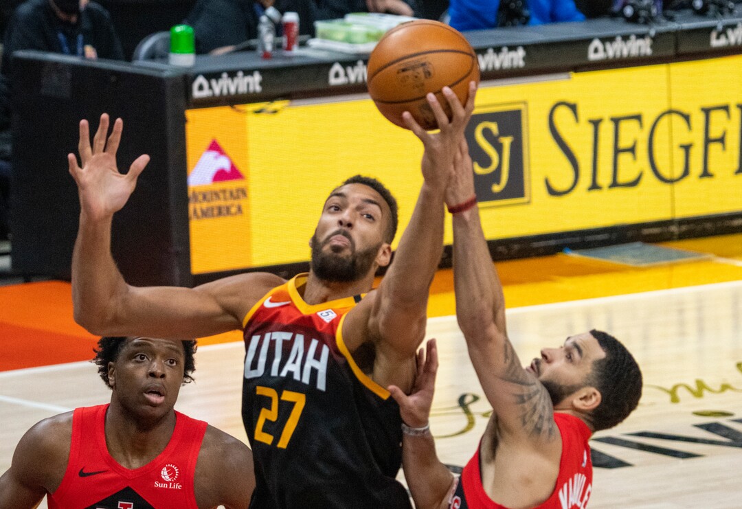 (Rick Egan | The Salt Lake Tribune) Utah Jazz center Rudy Gobert (27) grabs a rebound, in NBA action between the Utah Jazz and the Toronto Raptors at Vivint Arena, on Saturday, May 1, 2021.