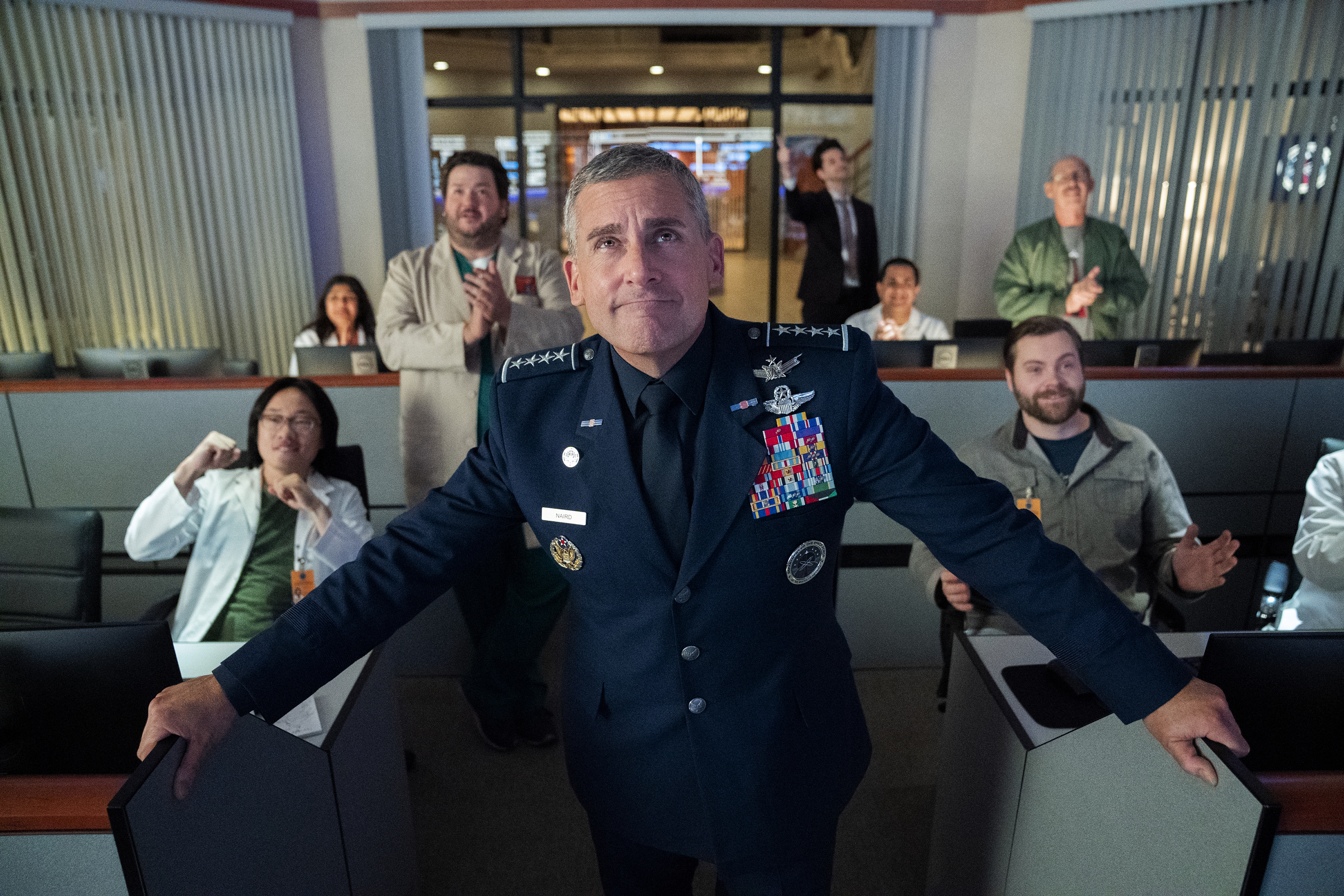 (Aaron Epstein | Netflix via AP) This image released by Netflix shows Steve Carell, center, from the comedy series "Space Force," available for streaming on Netflix on Friday.