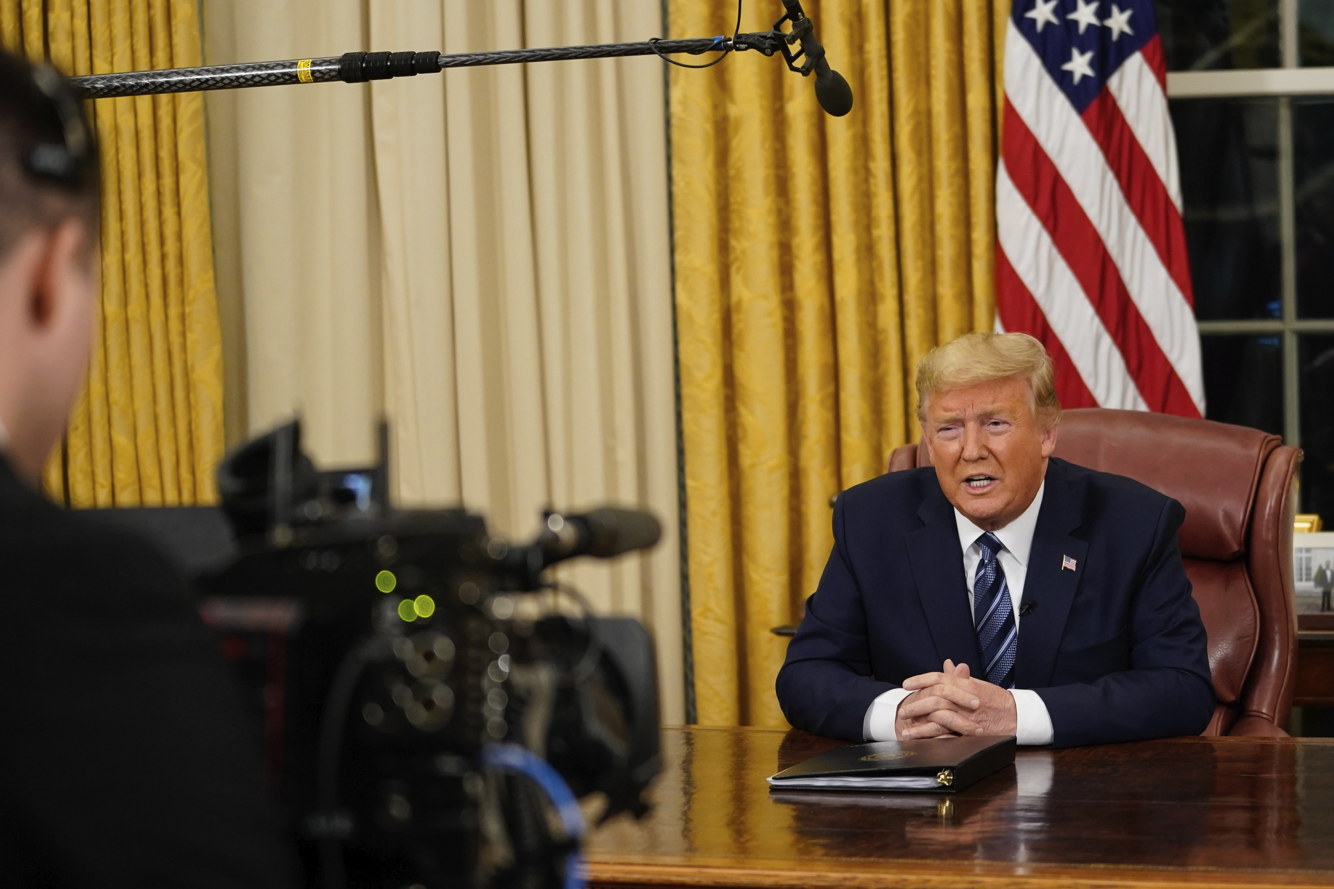 (Doug Mills | The New York Times | AP) President Donald Trump speaks in an address to the nation from the Oval Office at the White House about the coronavirus Wednesday, March, 11, 2020, in Washington.