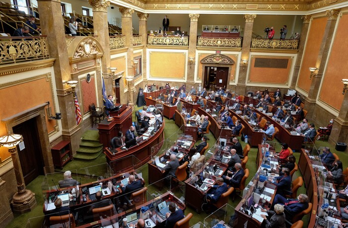 (Francisco Kjolseth  | The Salt Lake Tribune) Members of the House of Representatives are partitioned by plexiglass as the Utah State Legislature opens the 2021 legislative session at the Capitol in Salt Lake City on Tuesday, Jan. 19, 2021.