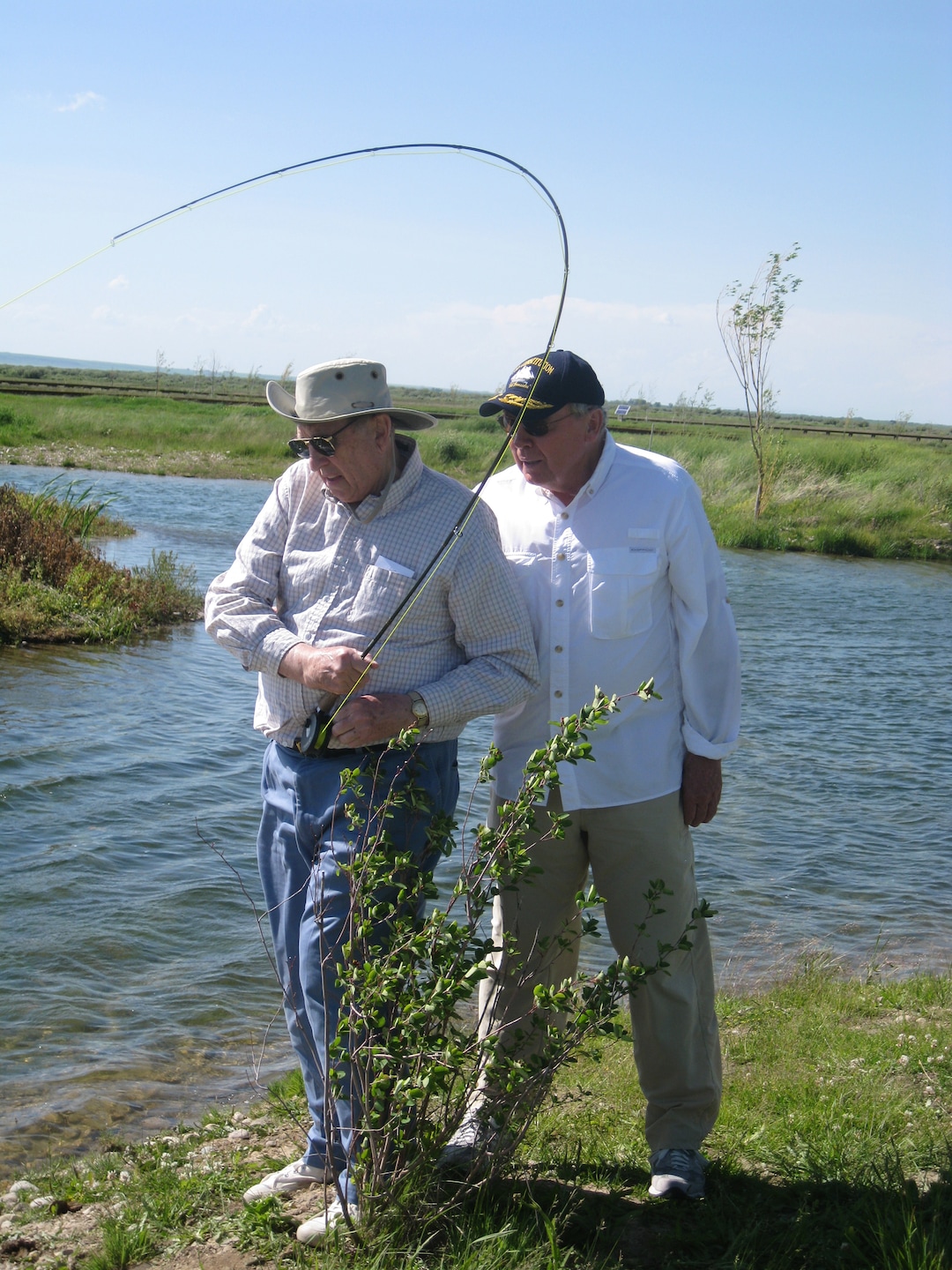 (photo courtesy Huntsman family) Jon Huntsman fishes with LDS Church President Thomas S. Monson in 2009.