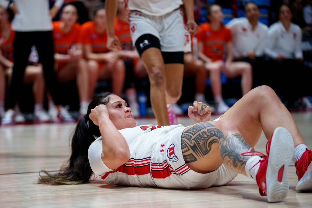 (Trent Nelson  |  The Salt Lake Tribune) Utah Utes forward Alissa Pili (35) pumps her fist after making an improbable diving shot while being fouled as Utah hosts Princeton, NCAA basketball in Salt Lake City on Sunday, March 19, 2023.