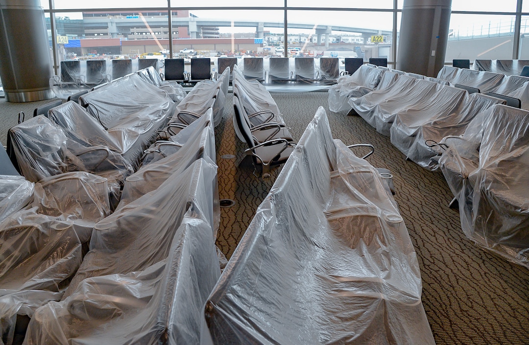 (Francisco Kjolseth  |  The Salt Lake Tribune) Chairs remain covered with plastic as crews continue their work in the first phase of construction of the Salt Lake City International Airport on Wednesday, May 20, 2020.