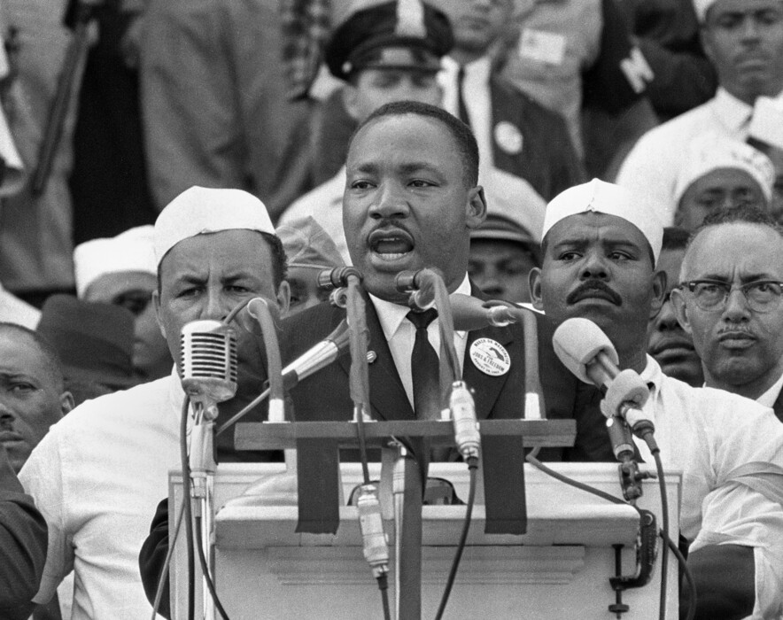FILE - In this Aug. 28, 1963,  file photo, Dr. Martin Luther King Jr., head of the Southern Christian Leadership Conference, addresses marchers during his "I Have a Dream" speech at the Lincoln Memorial in Washington. As civil rights leaders and activists gather Monday, Jan. 16, 2017, at sites across the country to celebrate the legacy of Martin Luther King Jr., the slain civil rights leader’s daughter Bernice King is encouraging Americans to fight for his vision of love and justice “no matter who is in the White House.” (AP Photo, File)