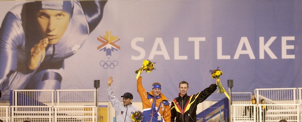 (Steve Griffin  |  Tribune file)  Olympic medalists Derek Parra, silver, Jochem Uytdehaage, gold, and Jens Boden, bronze, wave to the crowd during flower ceremony for the men's 5,000 meter speedskating race during the 2002 Olympic Games at the Utah Olympic Oval in Kearns.