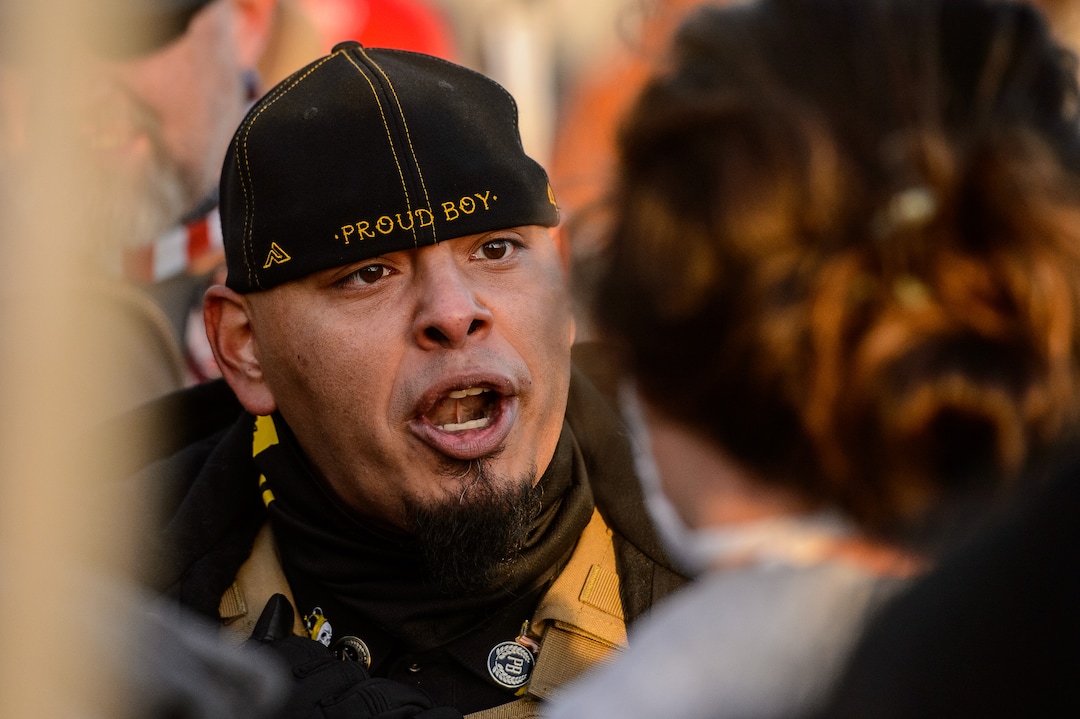 (Trent Nelson  |  The Salt Lake Tribune) An argument breaks out between members of the Proud Boys and people carrying a Black Lives Matter flag, as Trump supporters gathered at the State Capitol in Salt Lake City on Wednesday, Jan. 6, 2021.