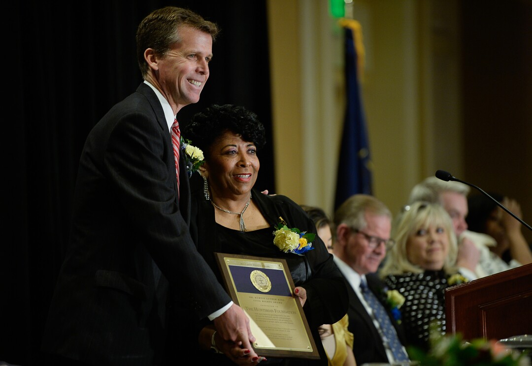 (Francisco Kjolseth  |  The Salt Lake Tribune) David Huntsman of the Huntsman Foundation receives the Dr. Martin Luther King Jr. Civil Rights Award from Jeanetta Williams, President of the NAACP Salt Lake Branch, during the Dr. Martin Luther King Jr. Memorial Luncheon at Little America Hotel on Monday, Jan. 20, 2020.
