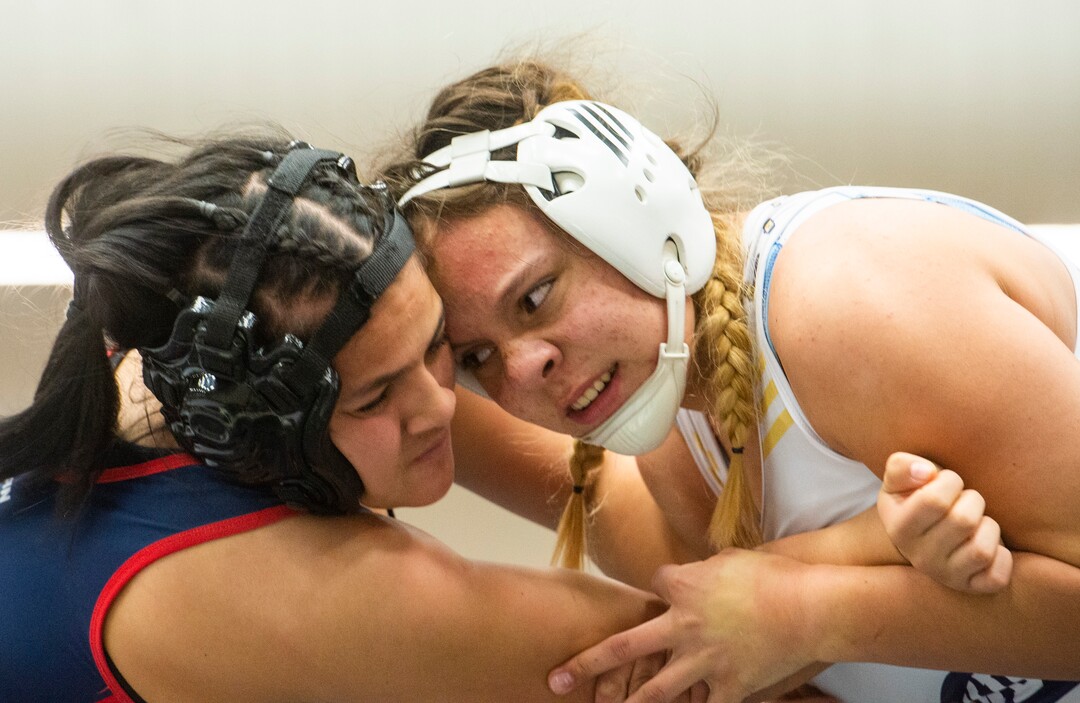 (Rick Egan | The Salt Lake Tribune)  Lizzie Shunn (Westlake) wrestles Hotaia Valeti (Springville) in the girls 140 division, at the High School All Star wrestling event in Orem, on Tuesday, Jan. 12, 2021.
