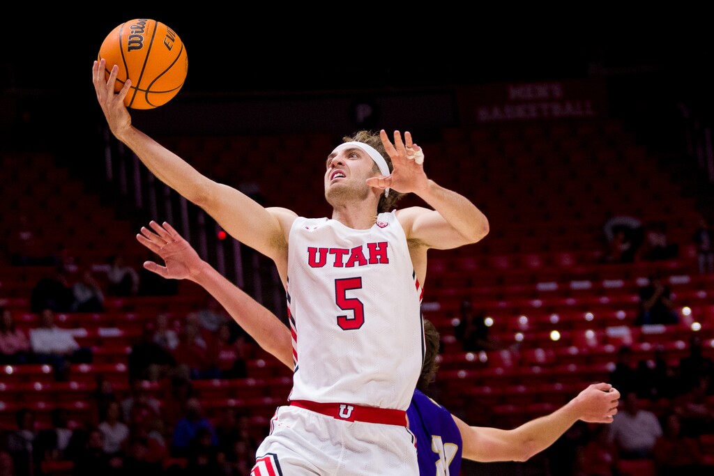 (Trent Nelson  |  The Salt Lake Tribune) Utah Utes guard Jaxon Brenchley (5) scores as the Utah Utes host the Westminster Griffins, NCAA basketball in Salt Lake City on Thursday, Nov. 4, 2021.