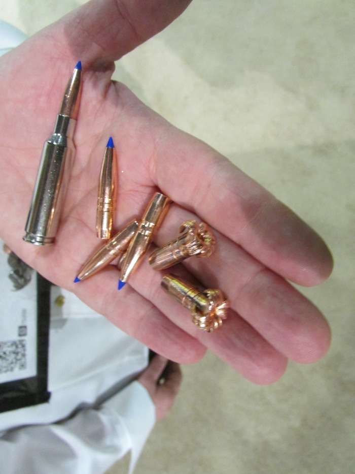 (Tom Wharton | Special to The Tribune) Barnes Bullets of Mona, which offers a variety of copper ammunition, displays a few at the SHOT Show in Las Vegas on Jan. 23, 2018. Note the two bullets that had been fired and what they look like after they hit the target.