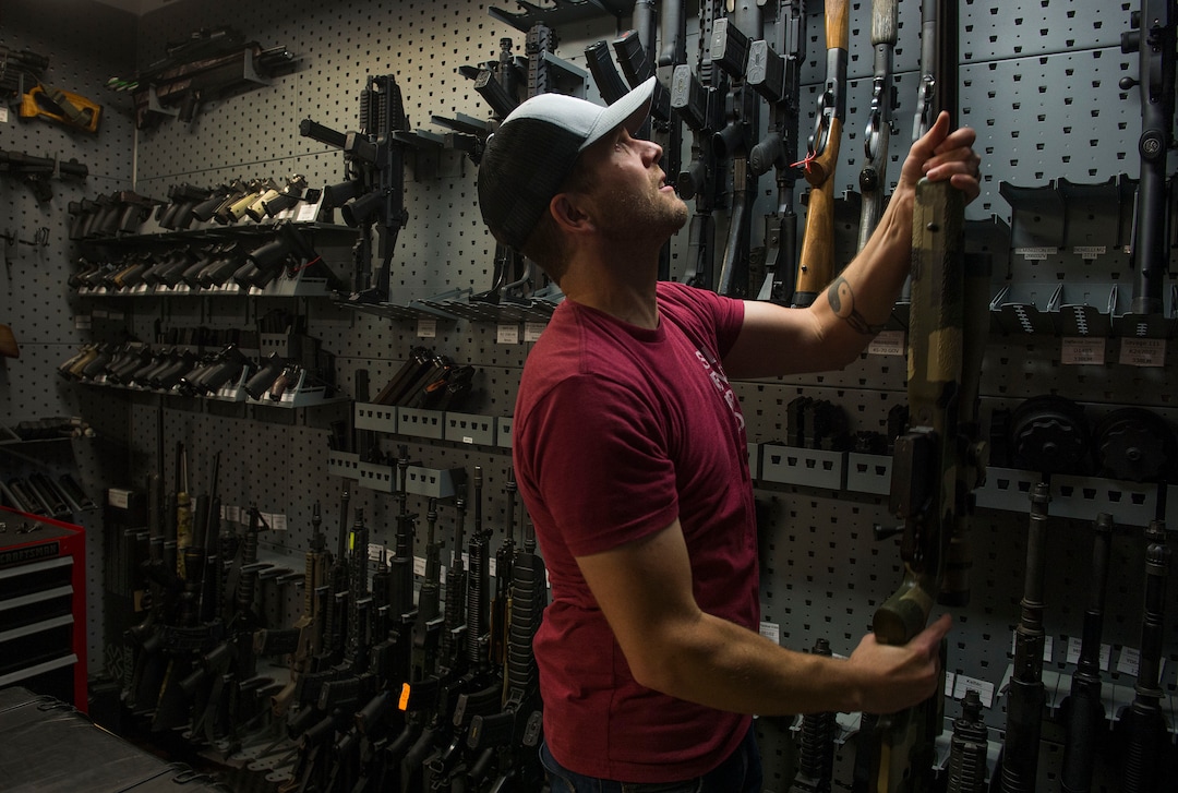 Leah Hogsten  |  The Salt Lake Tribune
Silencerco's public relations specialist Matt Pinnell pulls down a big bore rifle used for hunting to show Silencerco's Harvester 338 silencer. Silencerco is one of the country's largest manufacturers of silencer for guns of all kinds, Friday, May 28, 2017.