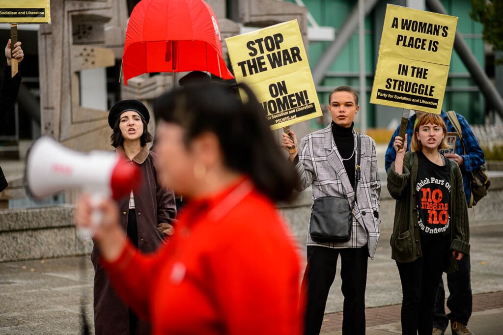 (Trent Nelson | The Salt Lake Tribune)  Sara Kang leads chants at a protest against the nomination of Brett Kavanaugh in front of the Wallace F. Bennett Federal Building in Salt Lake City, Thursday Oct. 4, 2018.