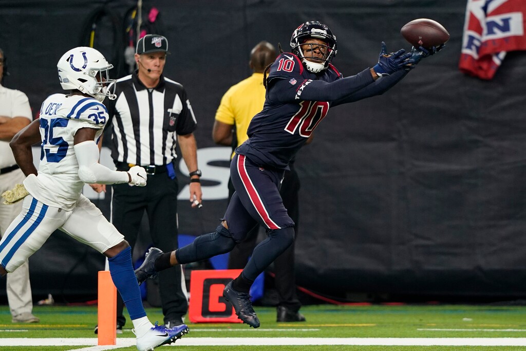 Houston Texans wide receiver DeAndre Hopkins (10) makes a touchdown catch past Indianapolis Colts cornerback Pierre Desir (35) during the second half of an NFL football game Thursday, Nov. 21, 2019, in Houston. (AP Photo/David J. Phillip)