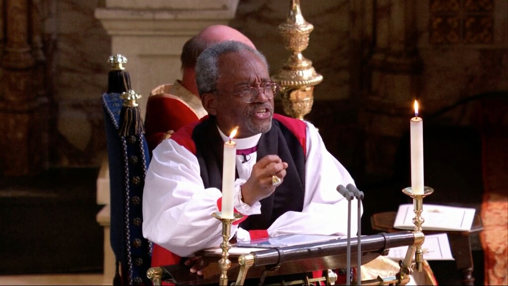 In this frame from video, the Most Rev. Michael Bruce Curry speaks during the wedding ceremony of Britain's Prince Harry and Meghan Markle at St. George's Chapel in Windsor Castle in Windsor, near London, England, Saturday, May 19, 2018.  (UK Pool/Sky News via AP)