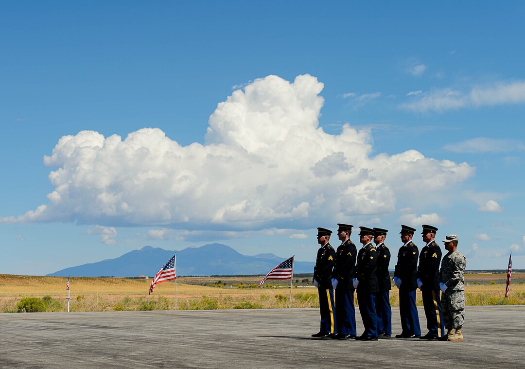 (Trent Nelson | The Salt Lake Tribune)  An honor guard prepares to receive the body of fallen soldier Aaron Butler, who was killed last week in Afghanistan, at the Monticello Airport, Thursday August 24, 2017.