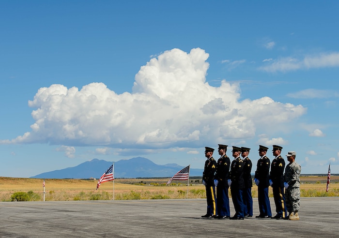 (Trent Nelson | The Salt Lake Tribune)  An honor guard prepares to receive the body of fallen soldier Aaron Butler, who was killed last week in Afghanistan, at the Monticello Airport, Thursday August 24, 2017.